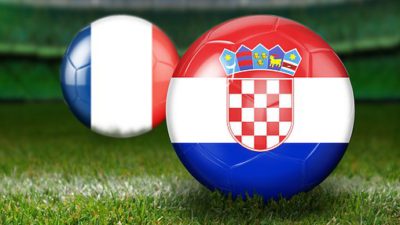 Två bollar med frankrike och kroatiens flagga på.