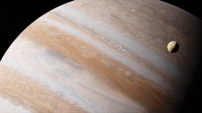 Planeten Jupiter med en måne som roterar runt den